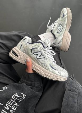 Жіночі кросівки New Balance Lyhythihainen T-Paita Impact Run London Edition Printed “metallic”