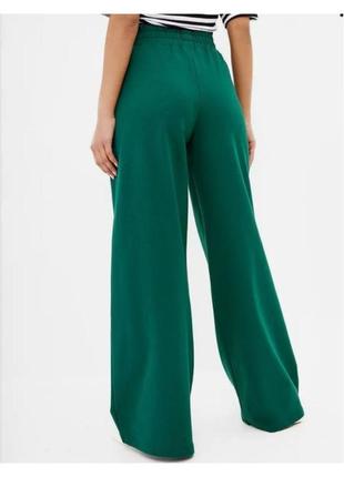 Жіночі штани труби кльош від стегна туреччина котон петля зелений3 фото
