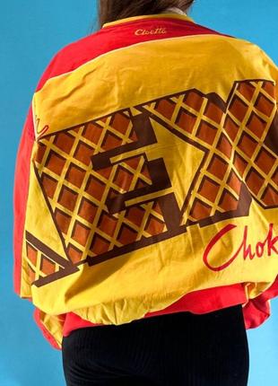 Вінтажна куртка бомбер 1980vintage 1980s red and yellow graphic racer style bomber jacket2 фото