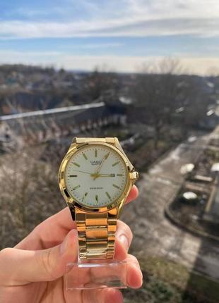 Золотые мужские наручные часы casio / касио6 фото