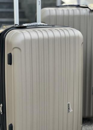 Ударопрочный wings средний чемодан дорожный m на колесах польша 75 литров4 фото