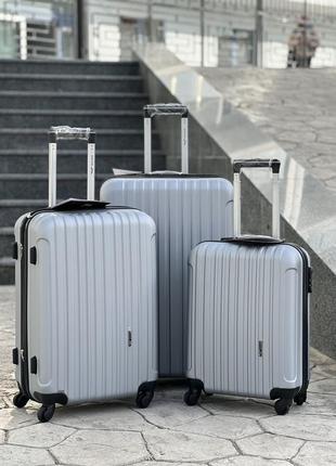 Ударопрочный wings средний чемодан дорожный m на колесах польша 75 литров1 фото