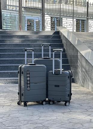 Полипропилен wings средний чемодан дорожный m на колесах польша 75 литров4 фото