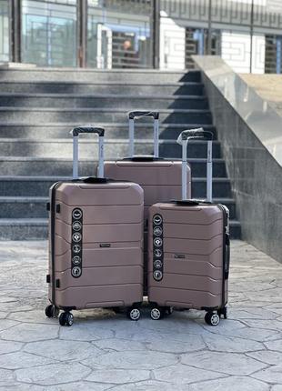 Полипропилен wings средний чемодан дорожный m на колесах польша 75 литров1 фото