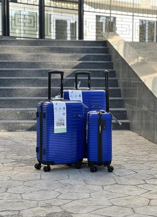 Ударопрочный пластиковый средний чемодан дорожный m на колесах 75 литров horoso3 фото