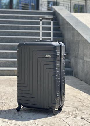 Ударопрочный пластиковый большой чемодан дорожный l на колесах 110 литров6 фото