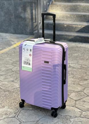 Ударопрочный пластиковый большой чемодан дорожный l на колесах 110 литров horoso5 фото