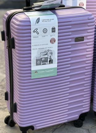 Ударопрочный пластиковый большой чемодан дорожный l на колесах 110 литров horoso3 фото