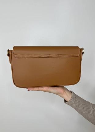 Жіноча шкіряна сумка під бренд в рудому кольорі5 фото