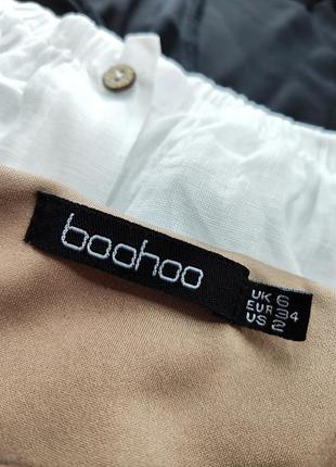 Бежевий боді з воланом на плечі boohoo.6 фото