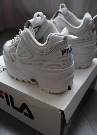 Білі кроси на платформі fila disruptor ii wedge6 фото