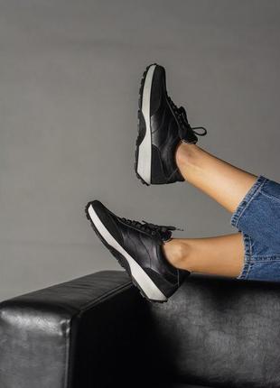 Жіночі легкі кросівки чорного кольору із натуральної шкіри.4 фото