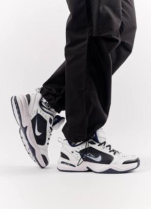 Кроссовки мужские nike air monarch travel white черно белые повседеневные кожаные кроссовки найк айр монарх8 фото