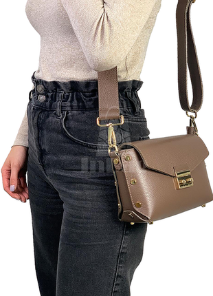 Шкіряна жіноча сумочка з заклепками італія9 фото