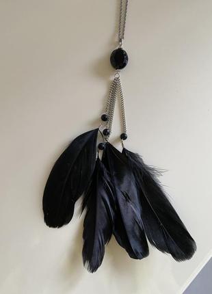 Прикраса на шию з пірʼям