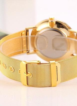 Жіночий наручний годинник на металевому ремінці золото2 фото