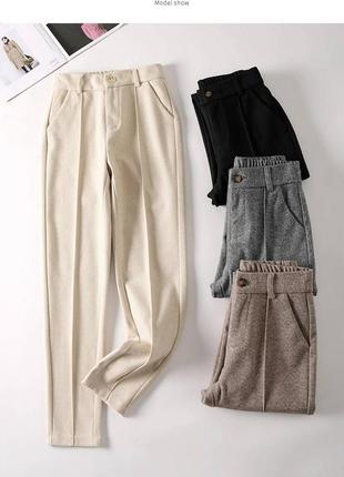Женские демисезонные шерстяные брюки в елочку со стрелками размер один 42-443 фото