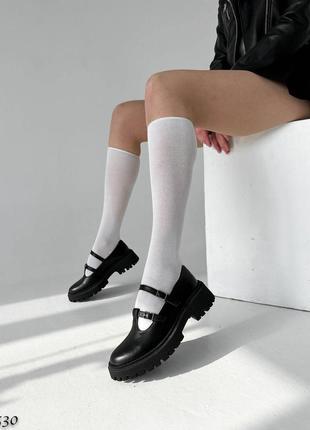 Чорні жіночі туфлі з ремінцями з натуральної шкіри10 фото
