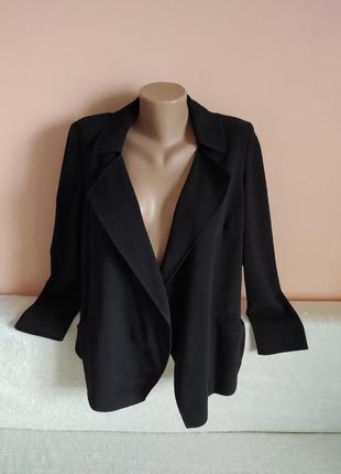 Гарненький піджачок, вказано р. 12.