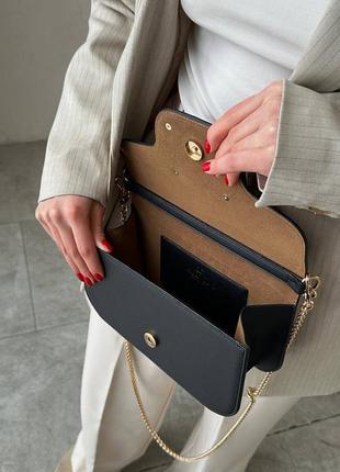 Жіноча шкіряна сумка у стилі valentino3 фото