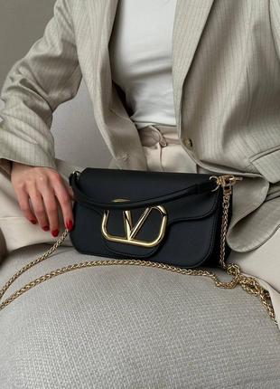 Жіноча шкіряна сумка у стилі valentino8 фото