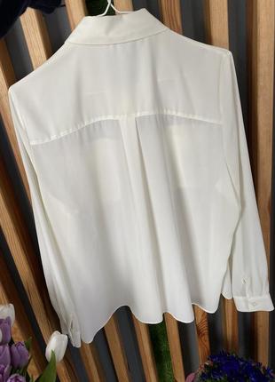 Кремова напівпрозора шифонова блуза-сорочка з кишенями4 фото