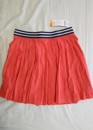 Красивая яркая красно-розовая юбка в складку.плиссе