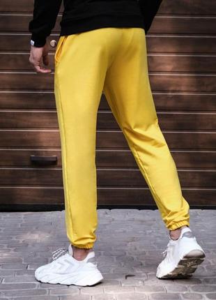 Чоловічі штани джогери з кишенями жовті pobedov 954 фото