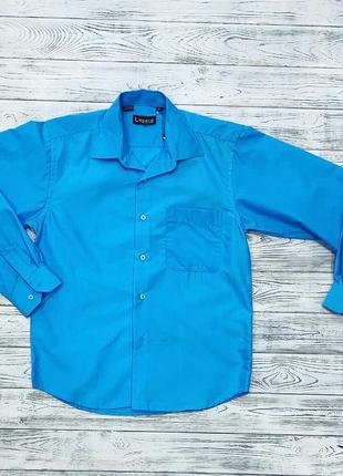 Сорочка блакитного кольору з довгим рукавом для хлопчика