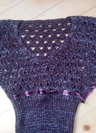 В'язана кофточка з люрексовою ниткою