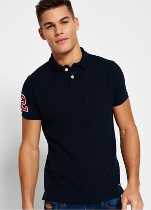 Поло синего цвета с тиснённым логотипом superdry classic pique the emboss polo made in turkey