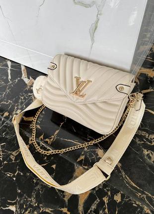 Бежева сумка в стилі vuitton new wave multi pochette beige