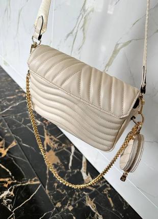 Бежева сумка в стилі vuitton new wave multi pochette beige8 фото