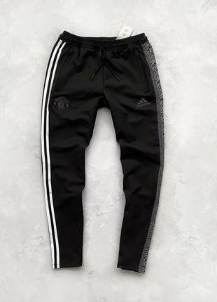 Спортивні штани adidas springs manchester united peter saville