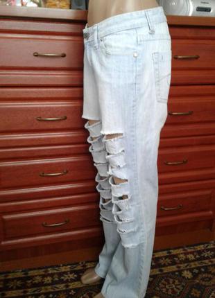 Голубые джинсы с дырками 29р3 фото