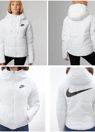 Жіноча двостороння оригінальна куртка nike2 фото