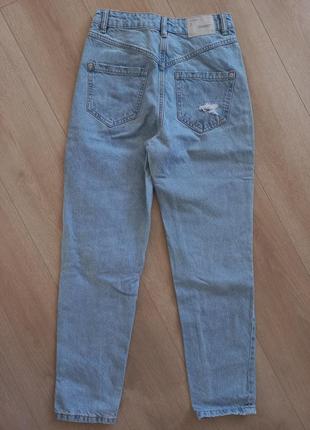Стильні джинси з розрізами2 фото
