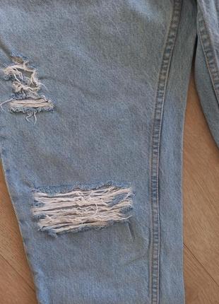 Стильні джинси з розрізами4 фото