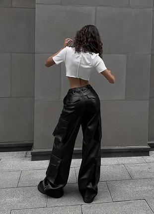 Чорні жіночі шкіряні штани карго вільного крою шкіряні штани палаццо з начасом4 фото