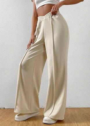Штани палаццо з оригінальним дизайном