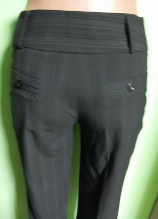 Нарядні жіночі класичні брюки6 фото