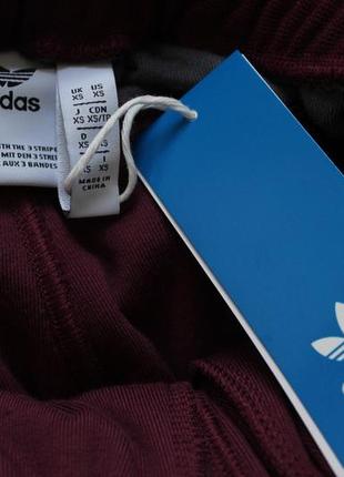 Якісні велюрові спортивні штани adidas бордового кольору4 фото