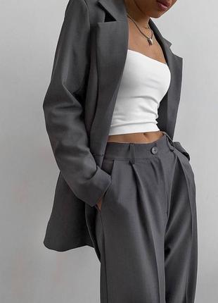 Костюм жіночий однотонний класичний оверсайз піджак на гудзику штани вільного крою на високій посадці якісний базовий графітовий7 фото
