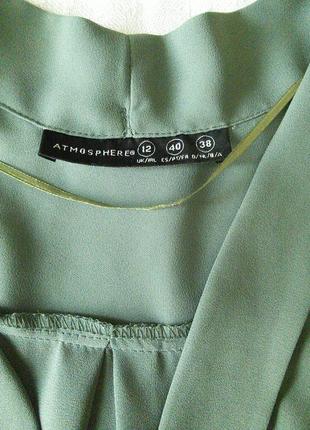 Прекрасна стильна блуза від atmosphere.приємного зеленого кольору. розмір 385 фото