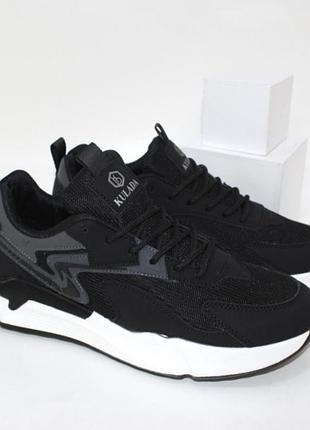 Чоловічі чорні замшеві кросівки комбіновані з текстилем.