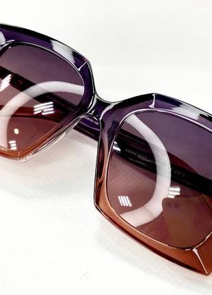Сонцезахисні окуляри жіночі бузково-сірі7 фото
