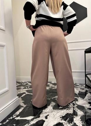 Стильні жіночі ділові брюки широкі вільного крою батал костюмні2 фото