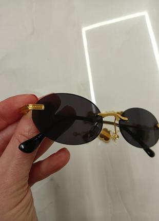 Стильні сонцезахисні чорні овальні окуляри4 фото