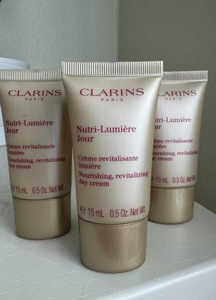 Відновлювальний денний крем clarins nutri-lumière day5 фото