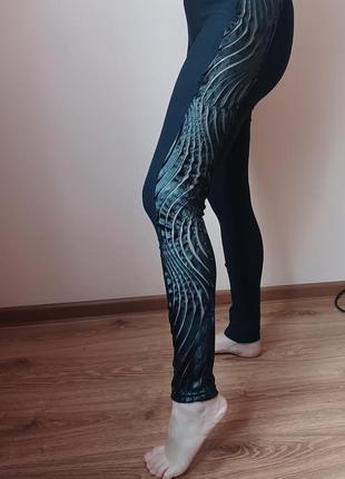 Лосины с кожаной отделкой по бокам 46 размер.